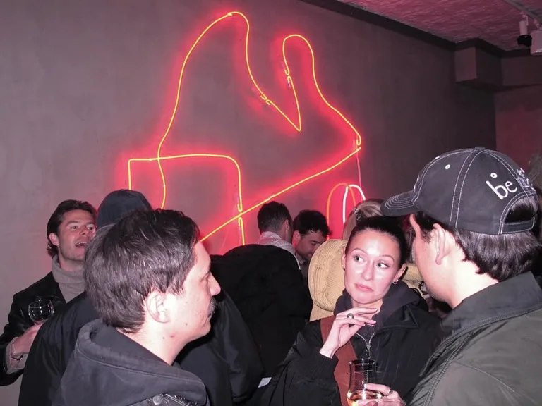 Vernissage of Pneuma with neon work and crowd