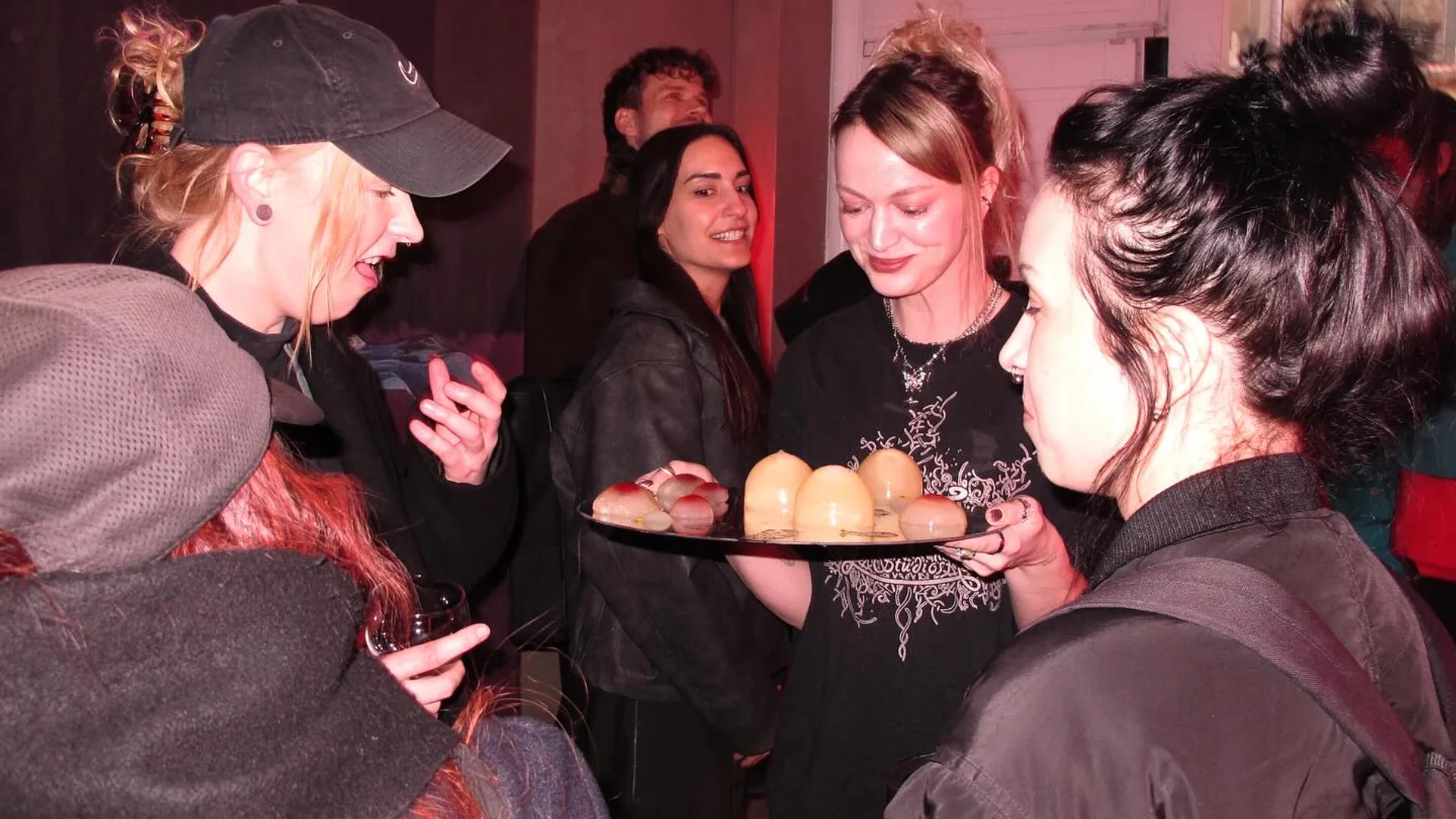 Vernissage of Pneuma with neon work and crowd