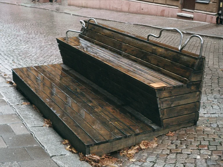 Iakta, forged steel artwork on the gallery bench, Svartensgatan