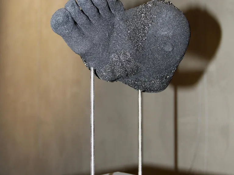 Artwork: Alexandra Moreno, A Knot In Motion (discarded tyres, epoxy, steel)